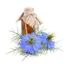 Schwarzkümmelöl mit Blüten